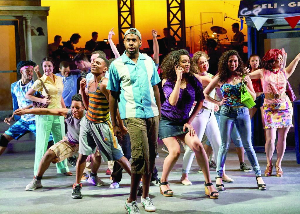 Ellis C. Dawson III, center, with the cast of “In the Heights.” PHOTO | Roger Mastroianni