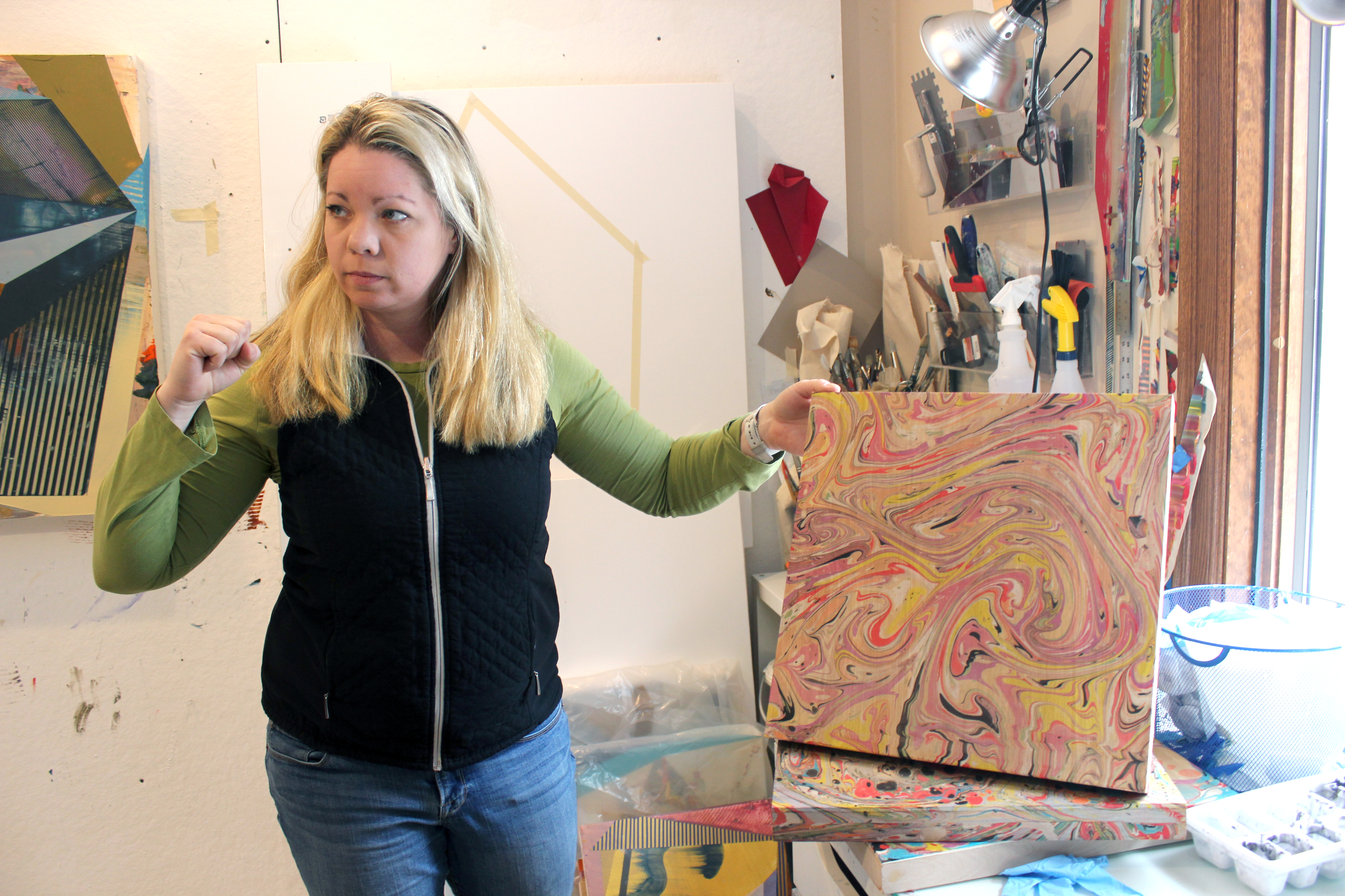 Jenniffer Omaitz discusses her marbling – a creative endeavor she undertakes in her spare time – while in her studio in Kent.