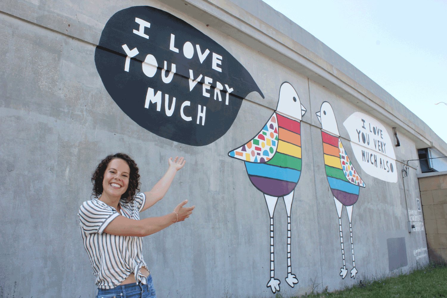 Guido presents “Love Doves,” a mural she co-created with Joe Lanzilotta on the West Shoreway retaining wall in Cleveland.