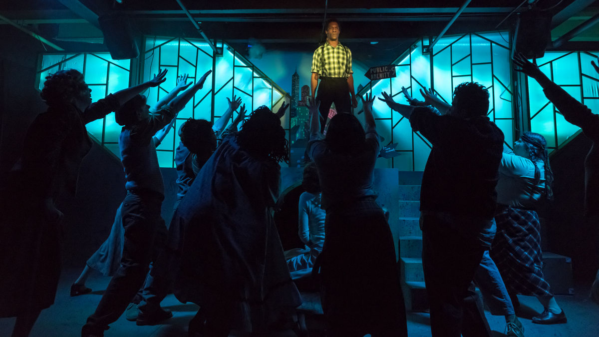 Daryl Kelley as Bobby Strong, center, and the “Urinetown” ensemble. Photo / Andy Dudik